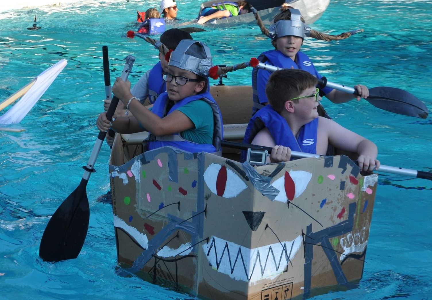 kids in cardboard boat